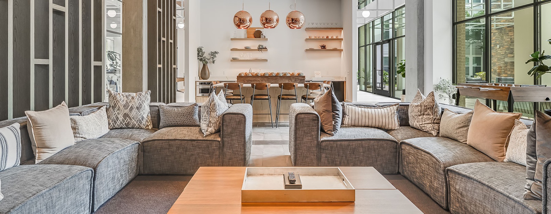 a lounge with couches and a coffee table