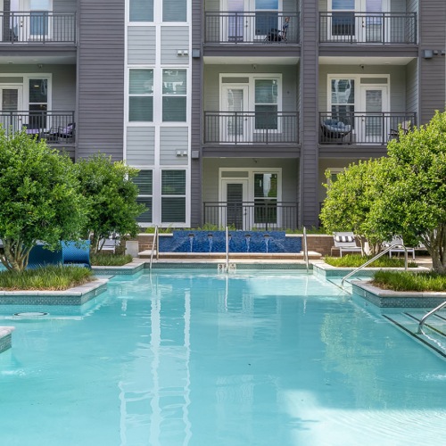 a swimming pool with trees