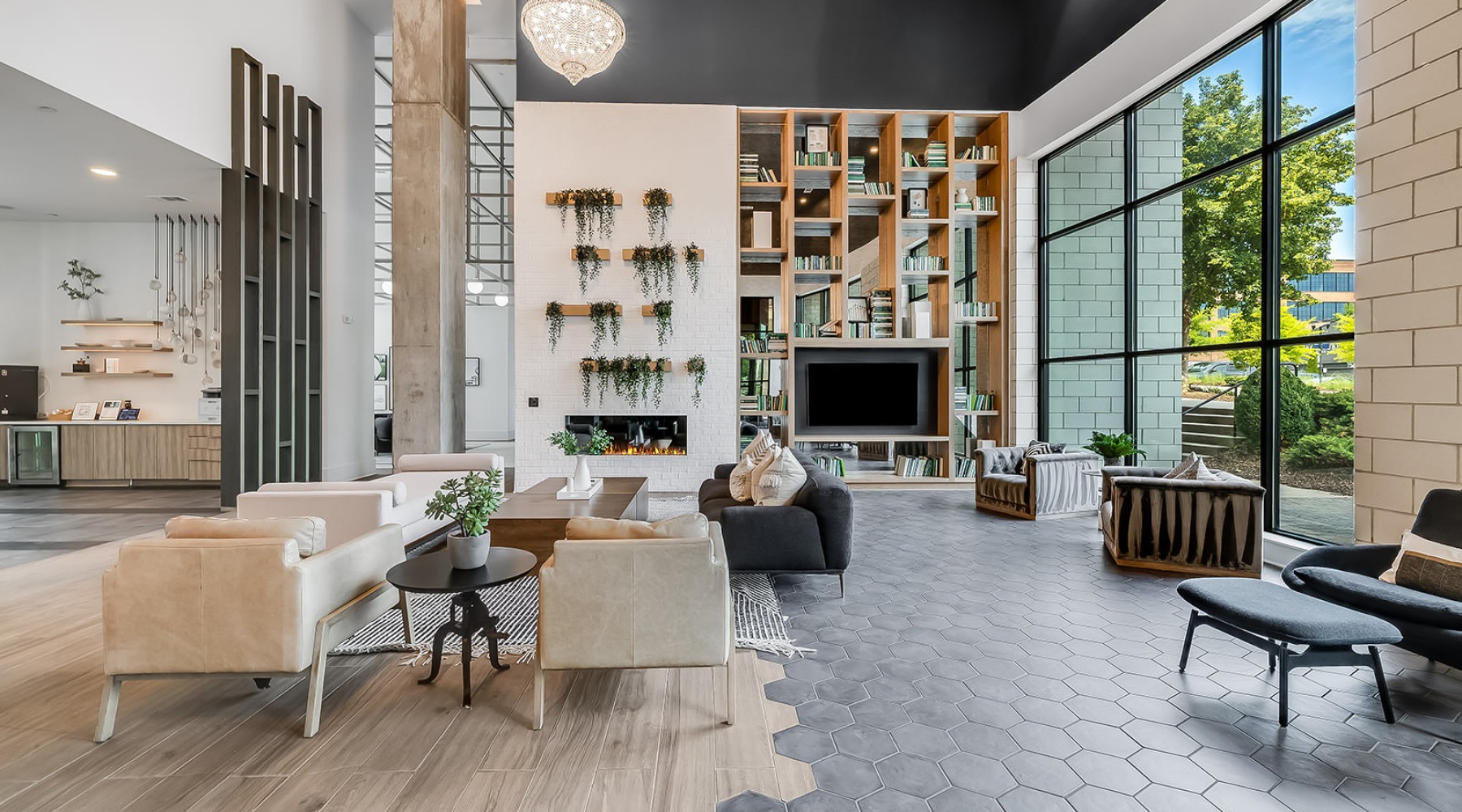 a clubroom with tables and chairs