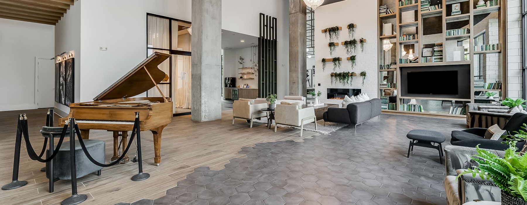 a clubroom with a piano and chairs