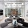 bright gallery room with social seating areas and tv monitors open to outdoor kitchen