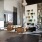 luxurious clubroom with fireplace and extravagant bookshelf