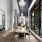 wide hall with seating areas open up to piano lounge