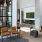piano lounge with natural lighting and sitting areas
