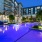 outdoor swimming pool lit up at night